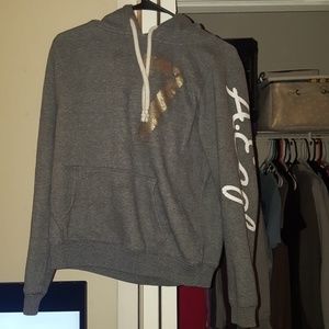 American eagle grey hoodie with a golden 7
